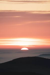 Preview wallpaper sunset, mountains, fog, dusk