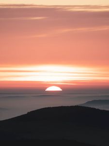 Preview wallpaper sunset, mountains, fog, dusk