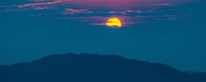 Preview wallpaper sunset, mountains, hills, clouds, dusk