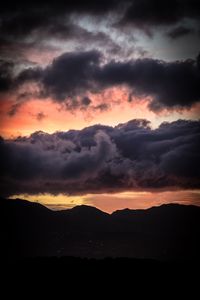 Preview wallpaper sunset, mountains, hills, sky, clouds