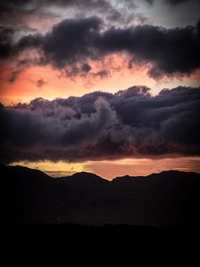 Preview wallpaper sunset, mountains, hills, sky, clouds