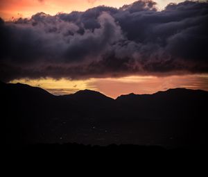 Preview wallpaper sunset, mountains, hills, sky, clouds