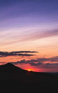 Preview wallpaper sunset, mountains, peak, sky