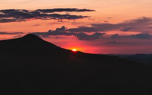 Preview wallpaper sunset, mountains, peak, sky