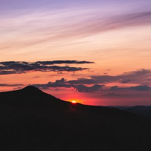 Preview wallpaper sunset, mountains, peak, sky