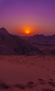 Preview wallpaper sunset, mountains, rocks, desert, sky