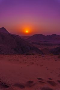 Preview wallpaper sunset, mountains, rocks, desert, sky