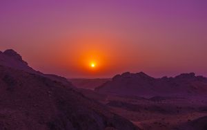 Preview wallpaper sunset, mountains, rocks, desert, sky