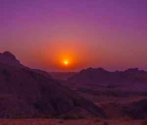 Preview wallpaper sunset, mountains, rocks, desert, sky