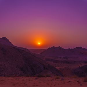 Preview wallpaper sunset, mountains, rocks, desert, sky