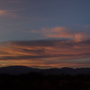 Preview wallpaper sunset, mountains, sky, clouds, evening, night