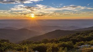 Preview wallpaper sunset, mountains, sun, light, landscape