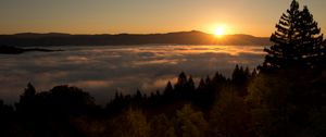 Preview wallpaper sunset, mountains, trees, clouds, dusk