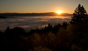 Preview wallpaper sunset, mountains, trees, clouds, dusk