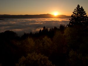 Preview wallpaper sunset, mountains, trees, clouds, dusk