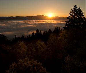Preview wallpaper sunset, mountains, trees, clouds, dusk