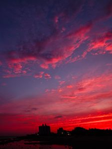 Preview wallpaper sunset, night city, sky, clouds