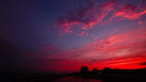 Preview wallpaper sunset, night city, sky, clouds