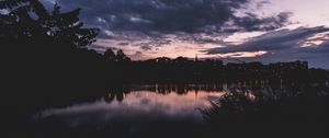 Preview wallpaper sunset, night, river, buildings, outlines, highland park, michigan