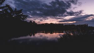 Preview wallpaper sunset, night, river, buildings, outlines, highland park, michigan