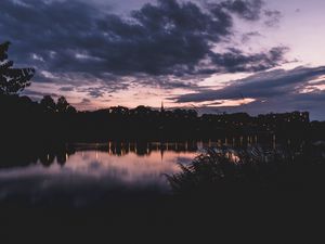 Preview wallpaper sunset, night, river, buildings, outlines, highland park, michigan