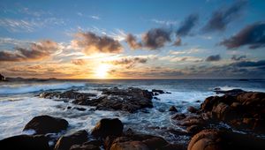 Preview wallpaper sunset, ocean, coast, stones, waves