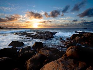 Preview wallpaper sunset, ocean, coast, stones, waves