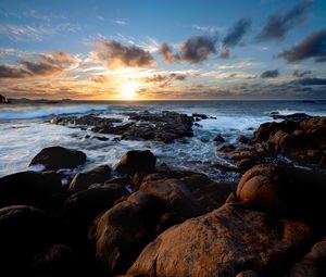 Preview wallpaper sunset, ocean, coast, stones, waves