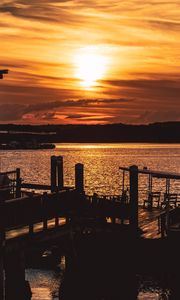 Preview wallpaper sunset, pier, river, evening, twilight