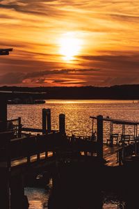 Preview wallpaper sunset, pier, river, evening, twilight