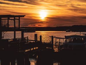 Preview wallpaper sunset, pier, river, evening, twilight