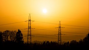 Preview wallpaper sunset, poles, wires, trees, outlines, dusk