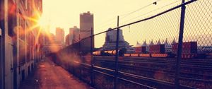 Preview wallpaper sunset, railroad, city