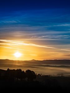 Preview wallpaper sunset, rays, hills, trees, sky