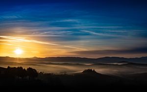 Preview wallpaper sunset, rays, hills, trees, sky