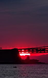 Preview wallpaper sunset, river, bridge, evening, red, twilight