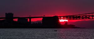 Preview wallpaper sunset, river, bridge, evening, red, twilight