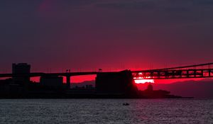 Preview wallpaper sunset, river, bridge, evening, red, twilight