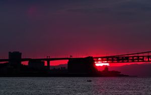 Preview wallpaper sunset, river, bridge, evening, red, twilight
