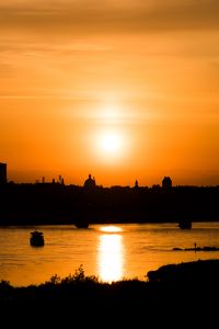 Preview wallpaper sunset, river, city, dusk, dark