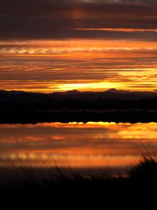 Preview wallpaper sunset, river, horizon, grass