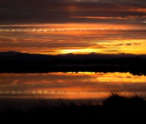 Preview wallpaper sunset, river, horizon, grass