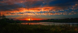 Preview wallpaper sunset, river, landscape, shore, reed