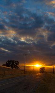 Preview wallpaper sunset, road, hills, sky