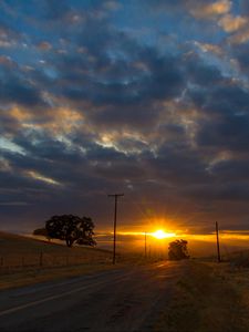 Preview wallpaper sunset, road, hills, sky