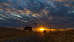 Preview wallpaper sunset, road, hills, sky