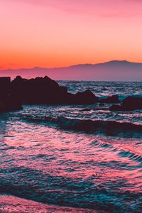 Preview wallpaper sunset, rocks, blocks, mountains