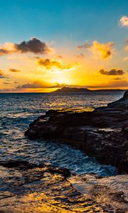 Preview wallpaper sunset, rocks, blocks, sun