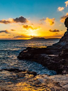 Preview wallpaper sunset, rocks, blocks, sun