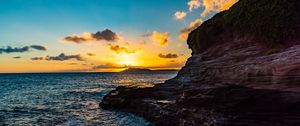 Preview wallpaper sunset, rocks, blocks, sun